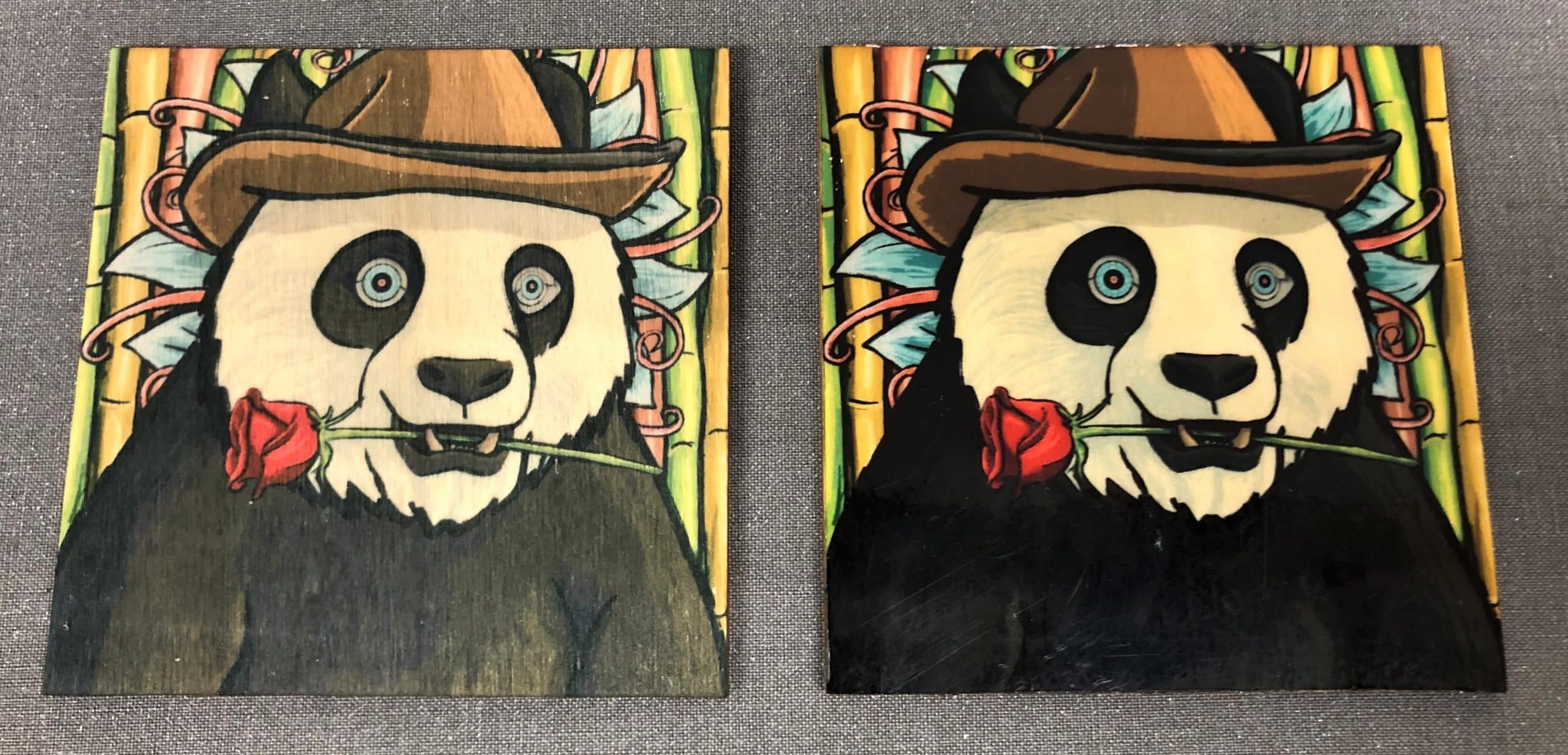 This images shows a finished sublimation project printed on wood tiles. The art is of a panda bear wearing a fedora with a red rose in its mouth and bamboo in the background.