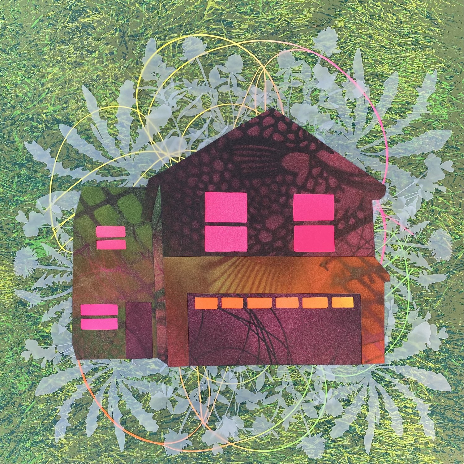 an image of a pink, orange and brown home on a green background, cut paper.