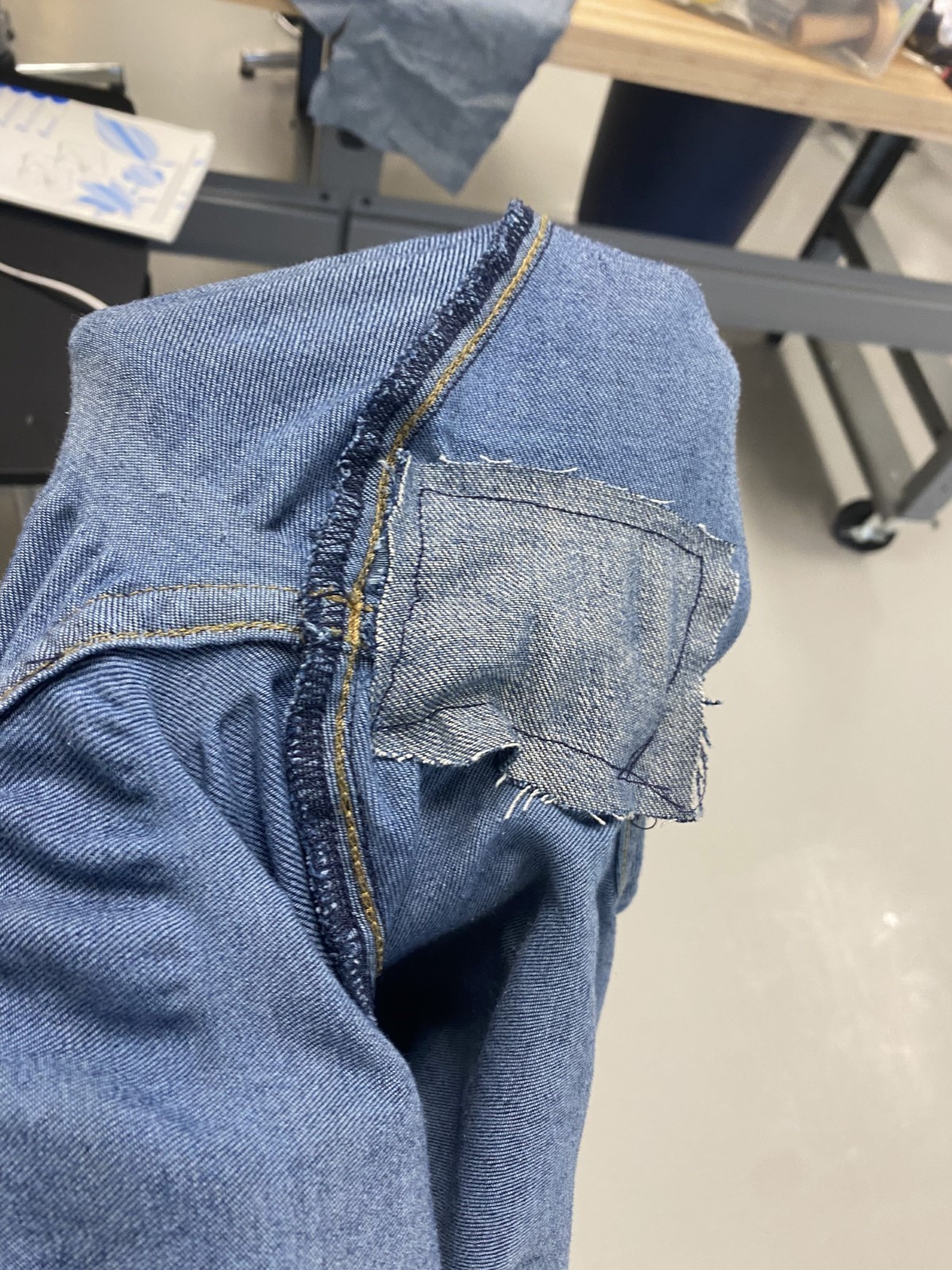 interior of jeans with a denim patch sewed inside