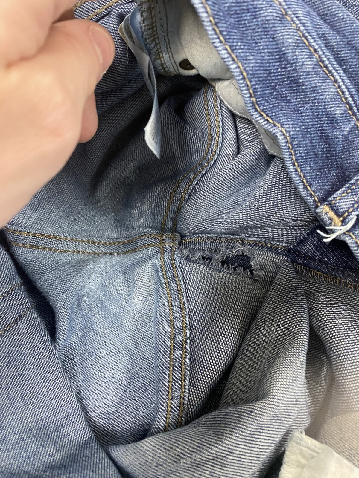 Interior of jeans to be repaired