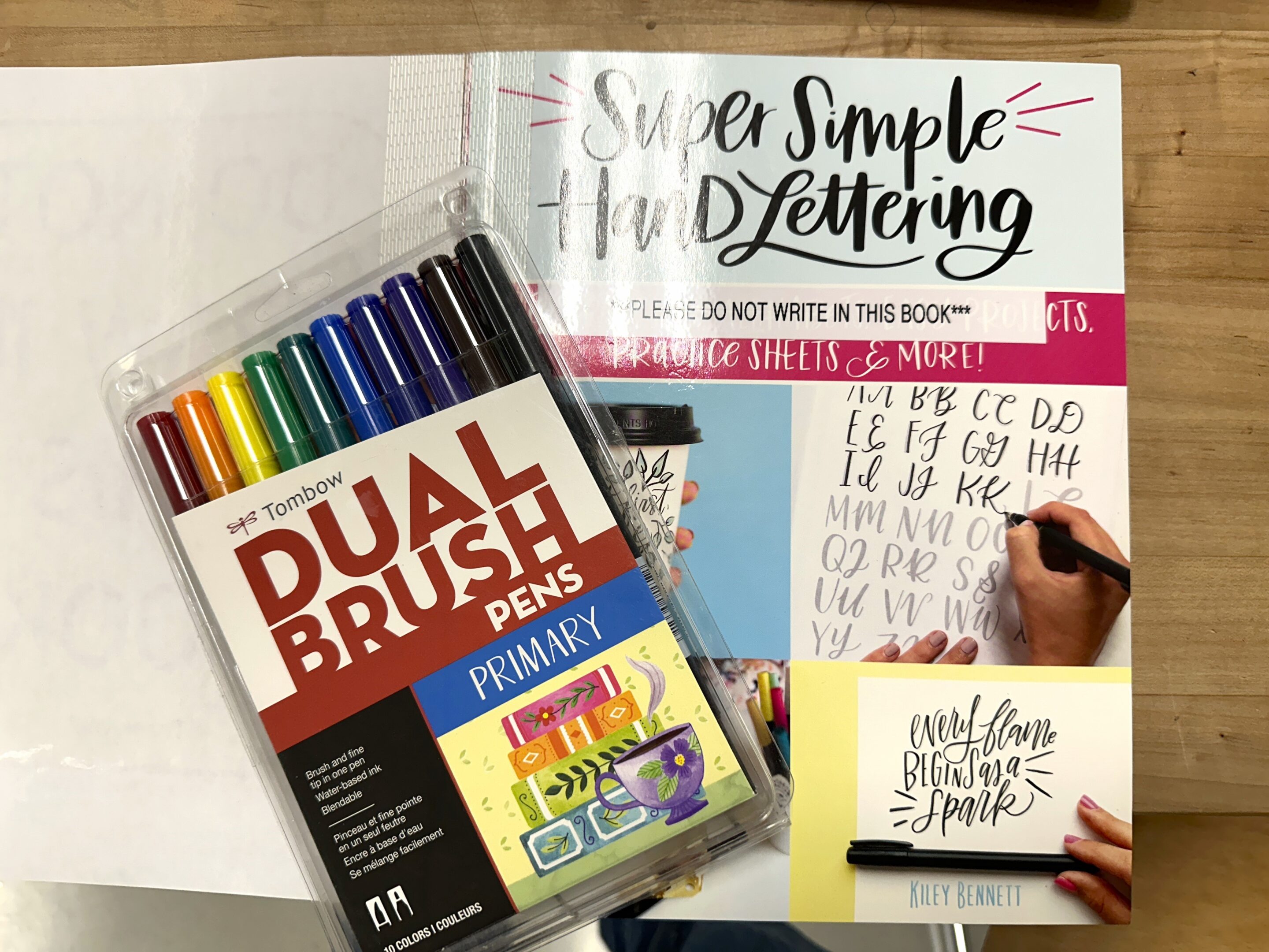 Brush pens and workbook available in the kit.