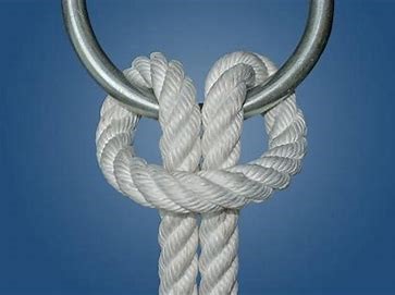 A knot looped around a metal keychain