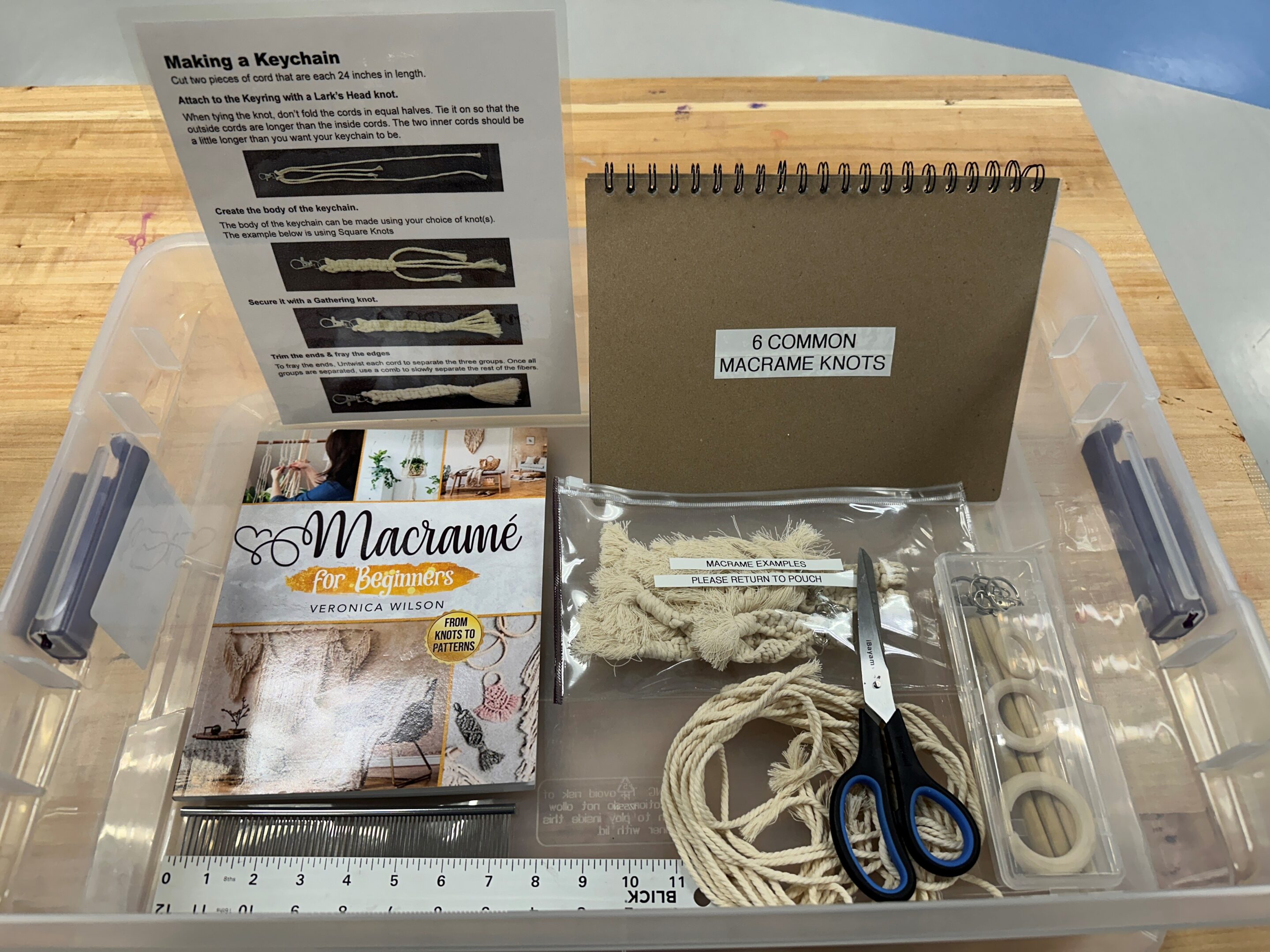 A photo of the Macrame Kit with all of its contents.