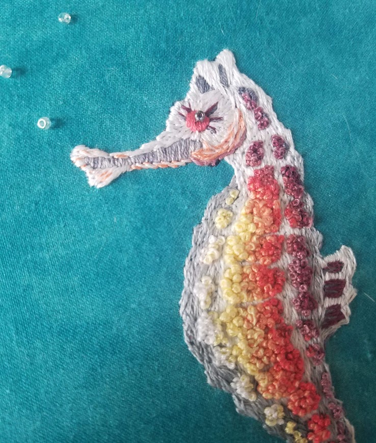 A needle felted sea horse.