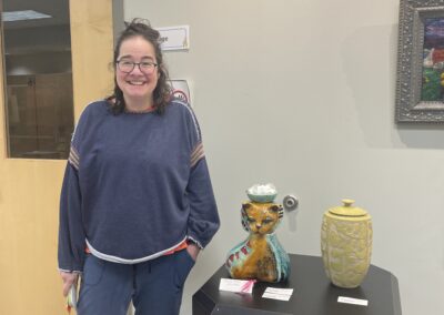 artist with artwork