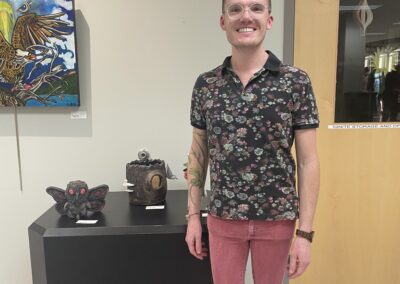 artist with artwork