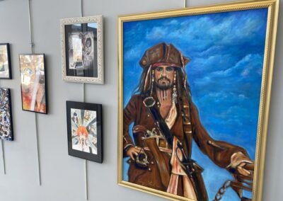 framed paintings in art gallery