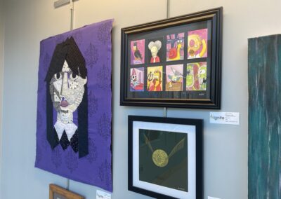 framed paintings in art gallery