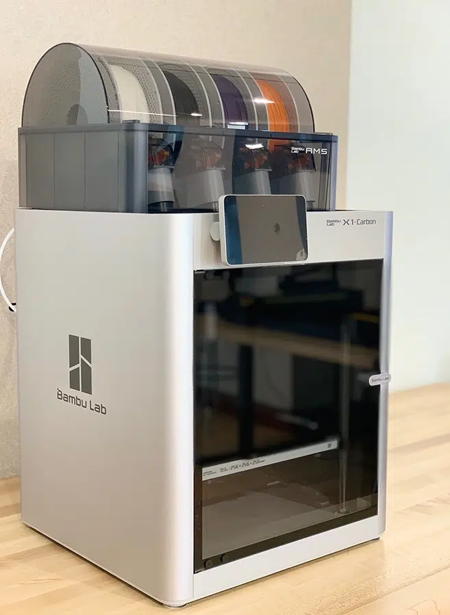 woman using sewing machine