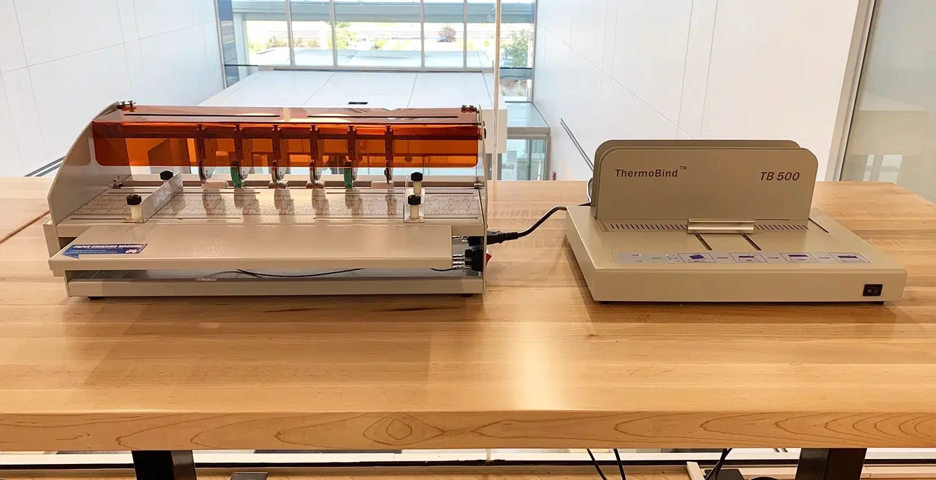 woman using sewing machine