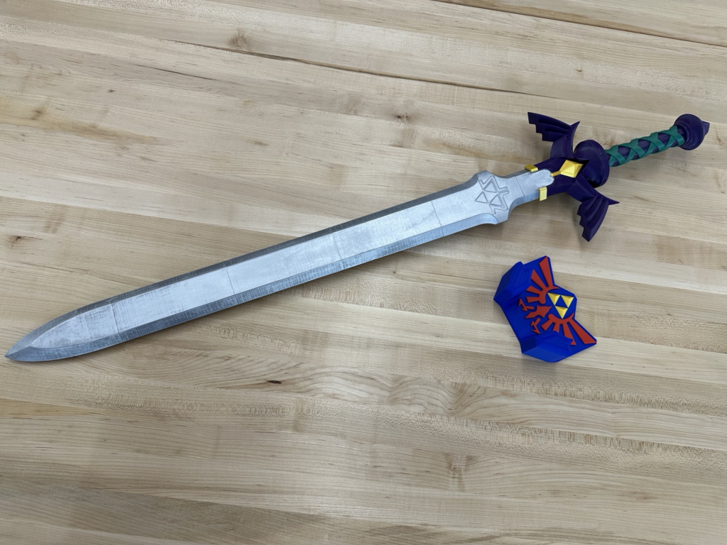 Fully 3D printed Zelda Master Sword and Wall Mount for LibraryCon! 2025.
