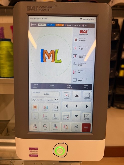 View of touch screen with green light.