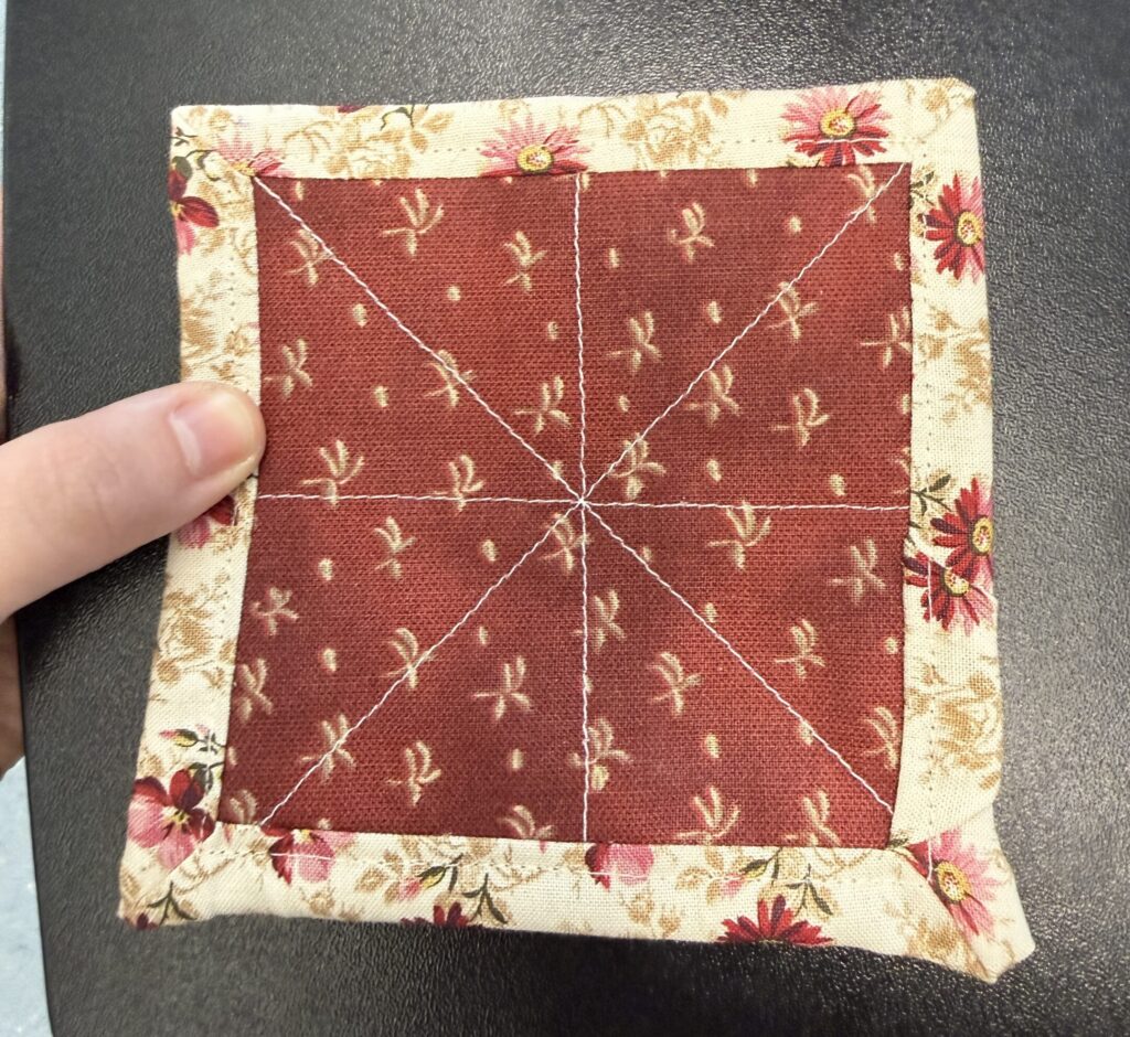 Finished coaster with bias tape edge.