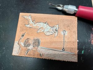 A linoleum block after carving 