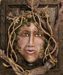 Artwork depicting a face surrounded by roots and leaves