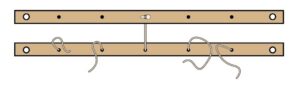 Diagram of tie-up bar with pegs removed.