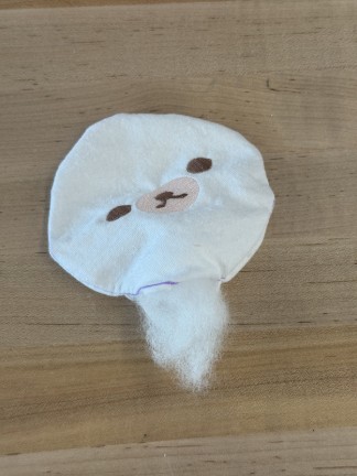 Sewn face turned right side out and beginning to be stuffed. 